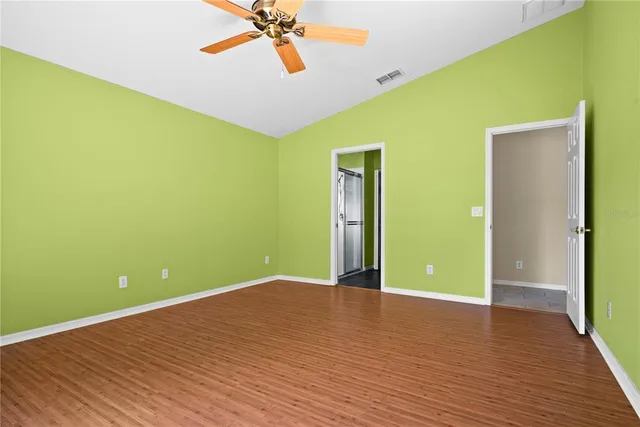 a view of a big room with wooden floor