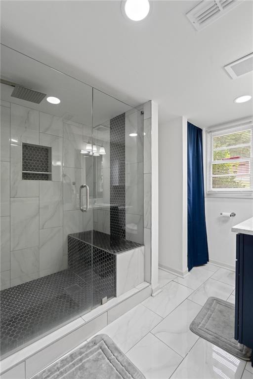 799 Pine Roc Drive Stone Mountain, GA 30083 - Photo 16 of 30 a bathroom with a shower and a sink