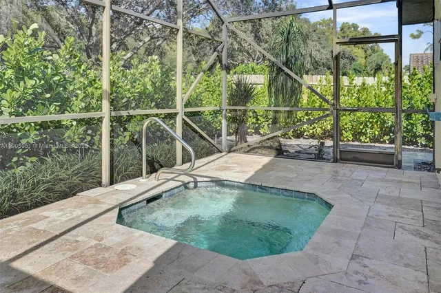 a white stove top oven sitting inside of a kitchen