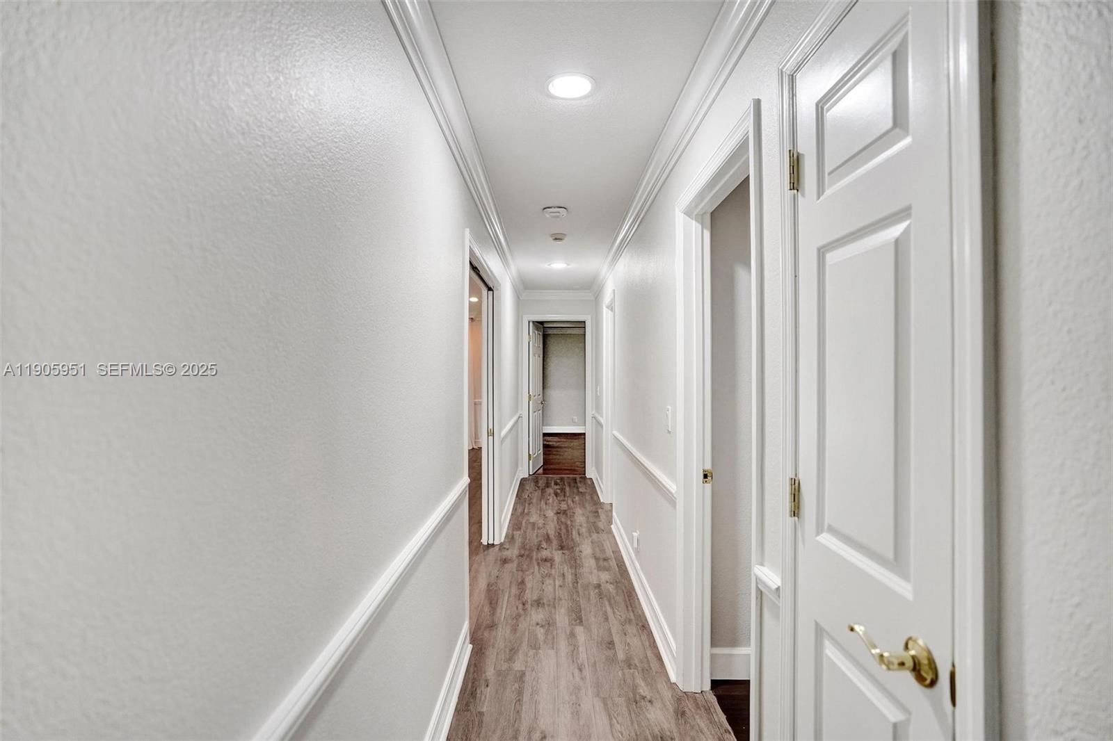 3801 Northwest 27th Avenue Boca Raton, FL 33434 - Photo 84 of 100 a view of gallery with wooden floor