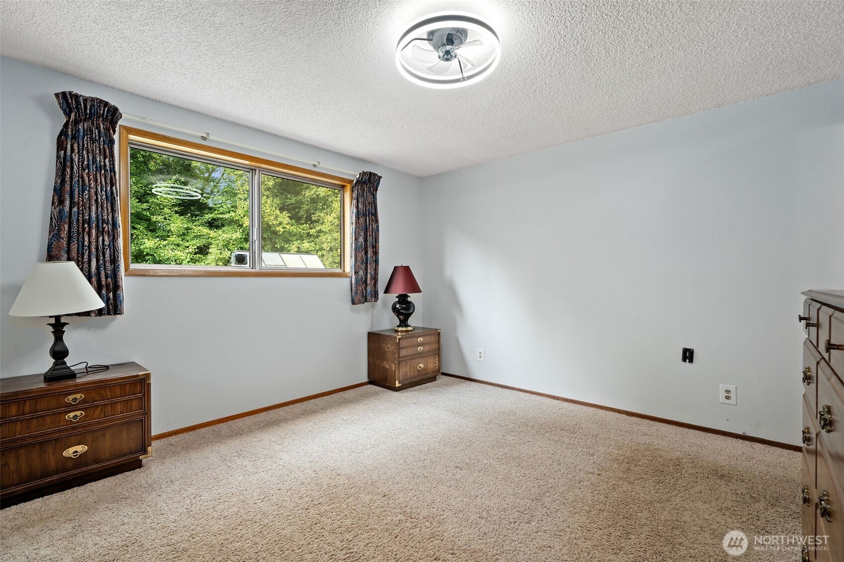 265 Cays Road Sequim, WA 98382 - Photo 22 of 40 a room with window and a fan