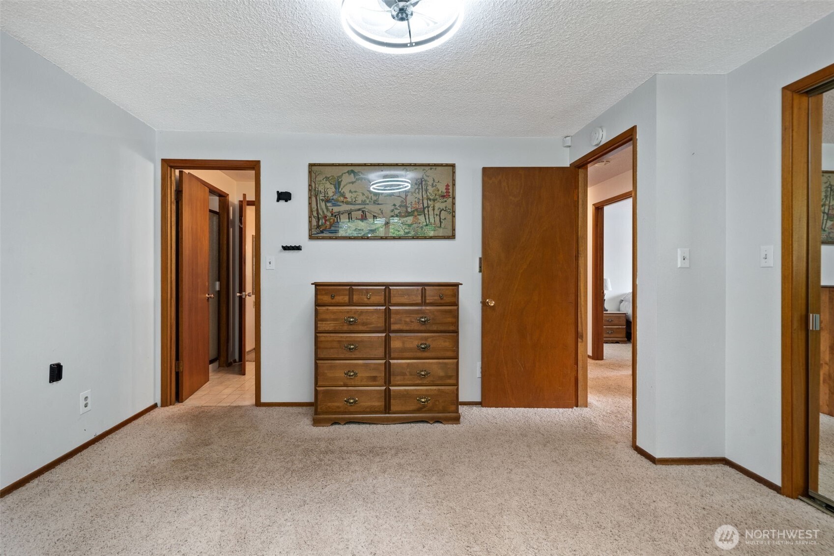 265 Cays Road Sequim, WA 98382 - Photo 24 of 40 an empty room with windows and closet