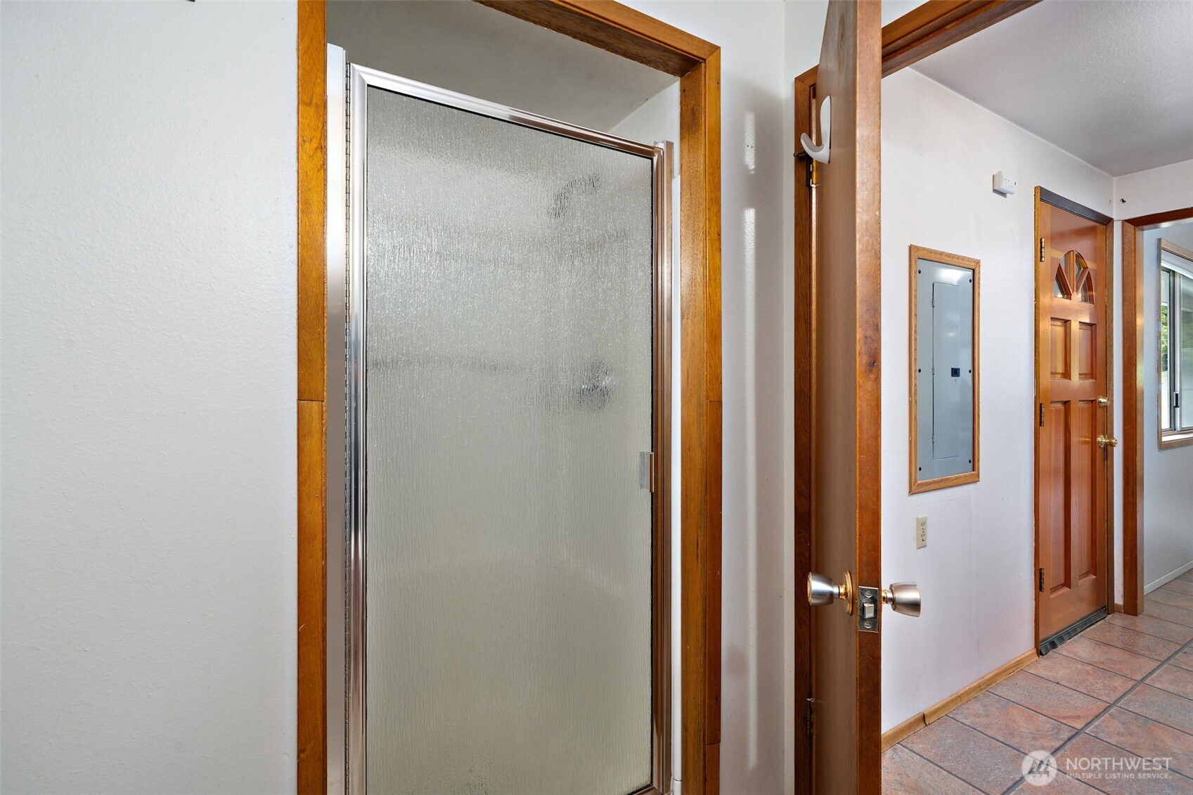 265 Cays Road Sequim, WA 98382 - Photo 26 of 40 a bathroom with a glass shower door