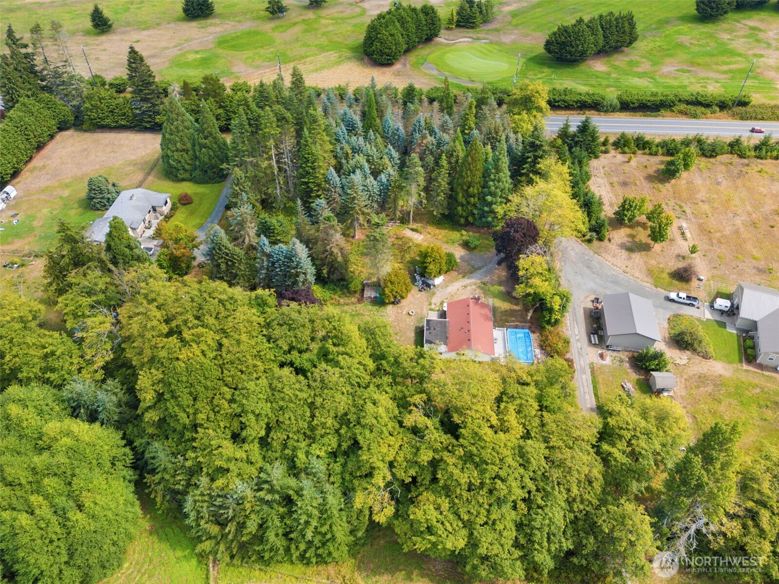 265 Cays Road Sequim, WA 98382 - Photo 31 of 40 an aerial view of residential house with outdoor space and swimming pool