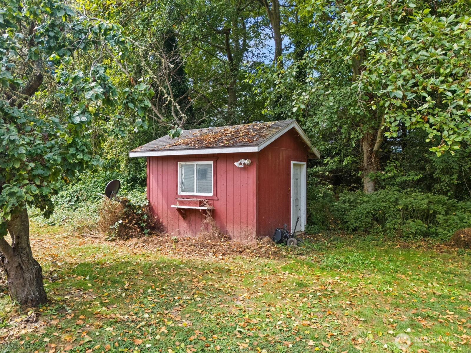 265 Cays Road Sequim, WA 98382 - Photo 38 of 40 a front view of a house with garden