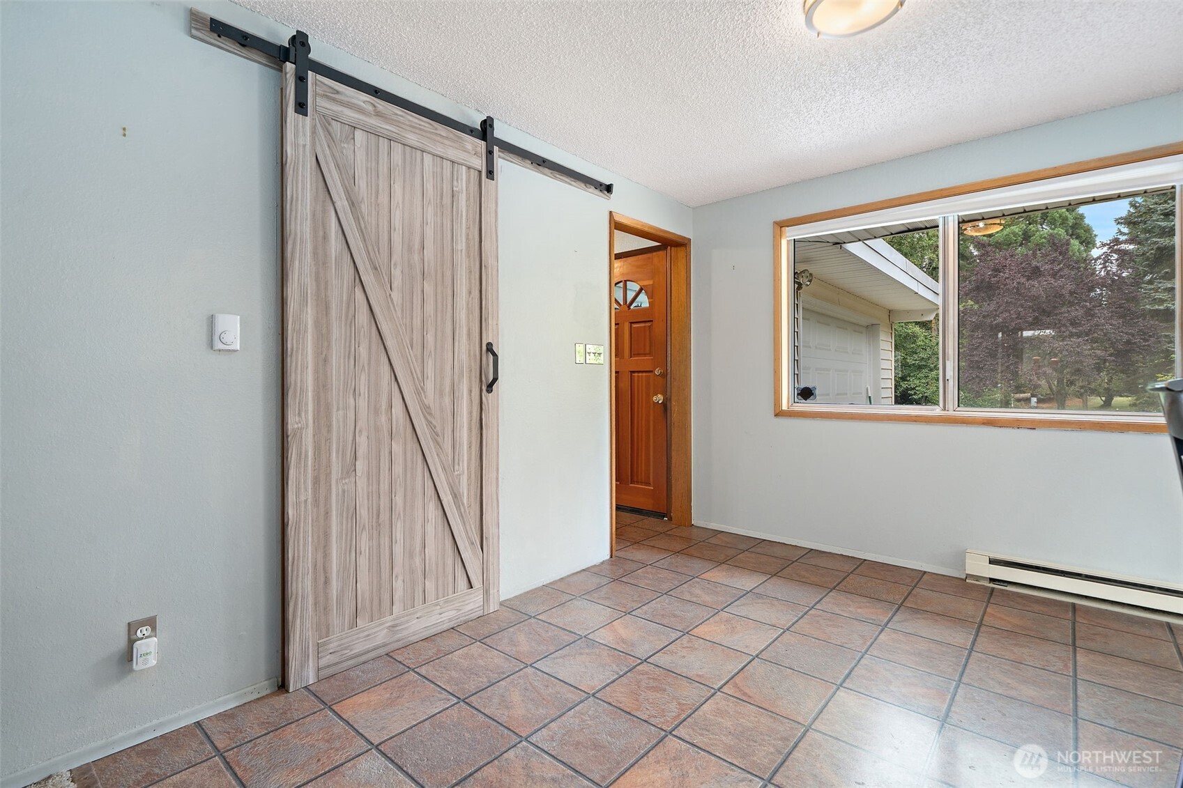 265 Cays Road Sequim, WA 98382 - Photo 8 of 40 a view of an empty room with a window