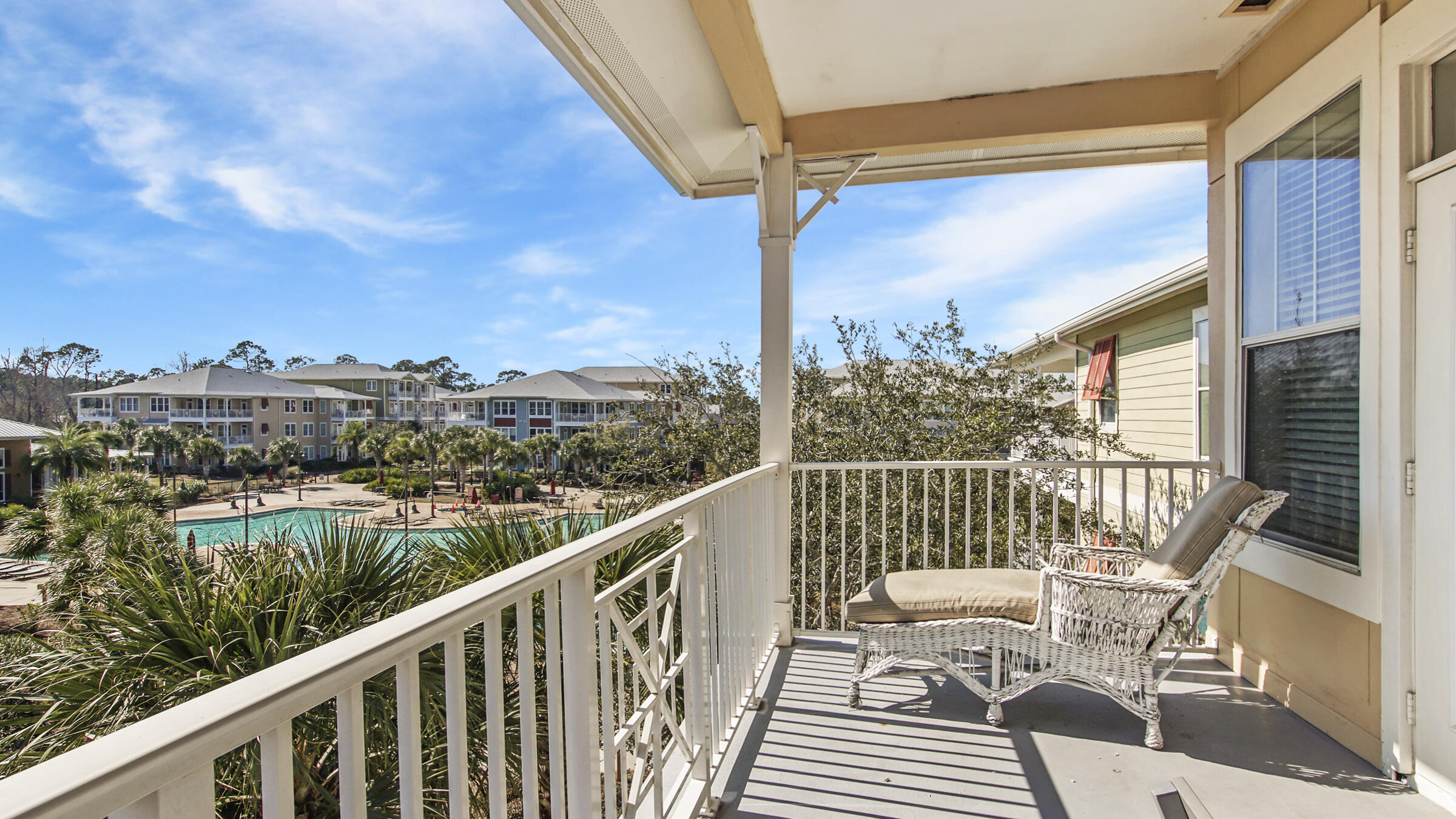 8700 Front Beach Road, Unit 5313 Panama City Beach, FL 32407 - Photo 1 of 38 a view of a chair and tables in the balcony