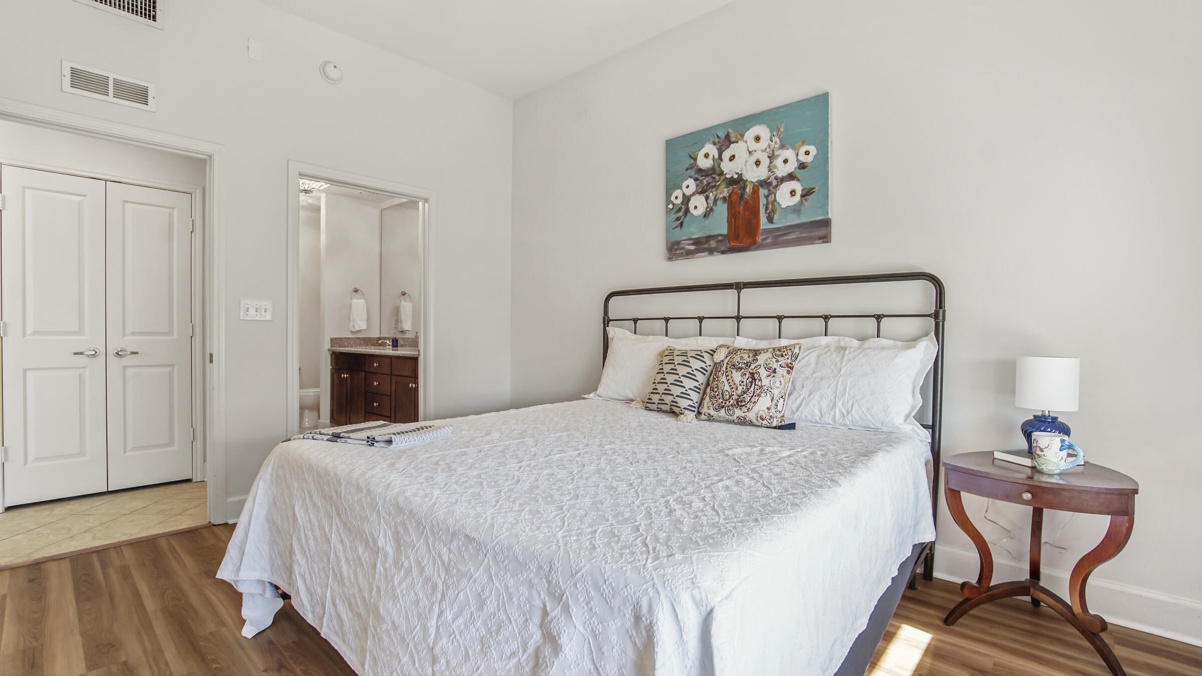 8700 Front Beach Road, Unit 5313 Panama City Beach, FL 32407 - Photo 16 of 38 a bedroom with a bed and a chair