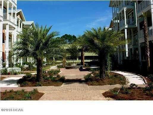 8700 Front Beach Road, Unit 5313 Panama City Beach, FL 32407 - Photo 31 of 38 a view of a backyard