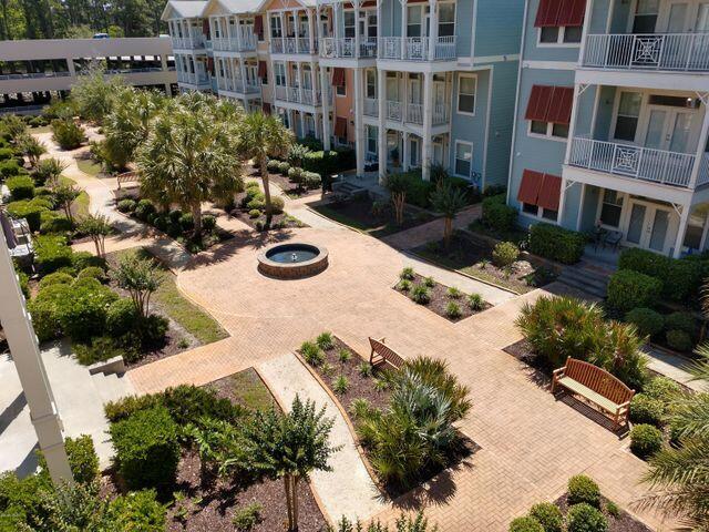 8700 Front Beach Road, Unit 5313 Panama City Beach, FL 32407 - Photo 35 of 38 an aerial view of a house with yard and lake view