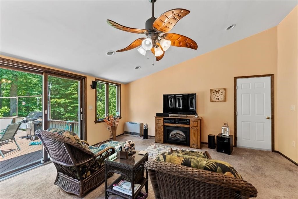 299 Bennett Road Hampden, MA 01036 - Photo 11 of 41 a living room with furniture and a flat screen tv