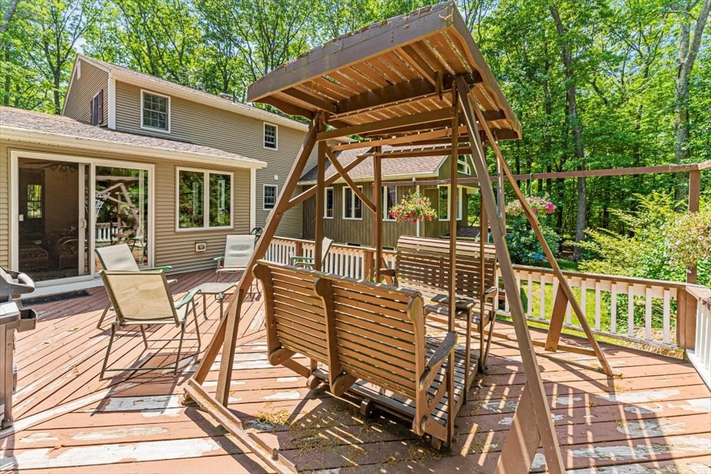 299 Bennett Road Hampden, MA 01036 - Photo 33 of 41 a view of a house with backyard and deck