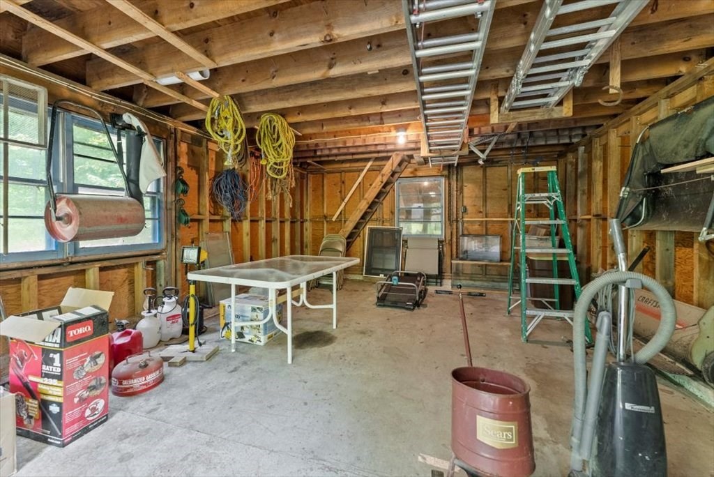 299 Bennett Road Hampden, MA 01036 - Photo 36 of 41 a view of a storage room with racks on the wall