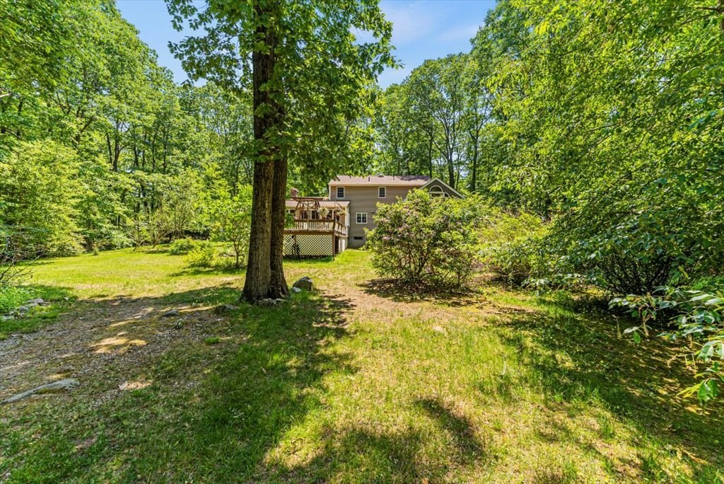 299 Bennett Road Hampden, MA 01036 - Photo 40 of 41 a view of a yard with trees