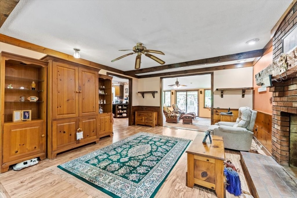 299 Bennett Road Hampden, MA 01036 - Photo 7 of 41 a living room with furniture and a rug