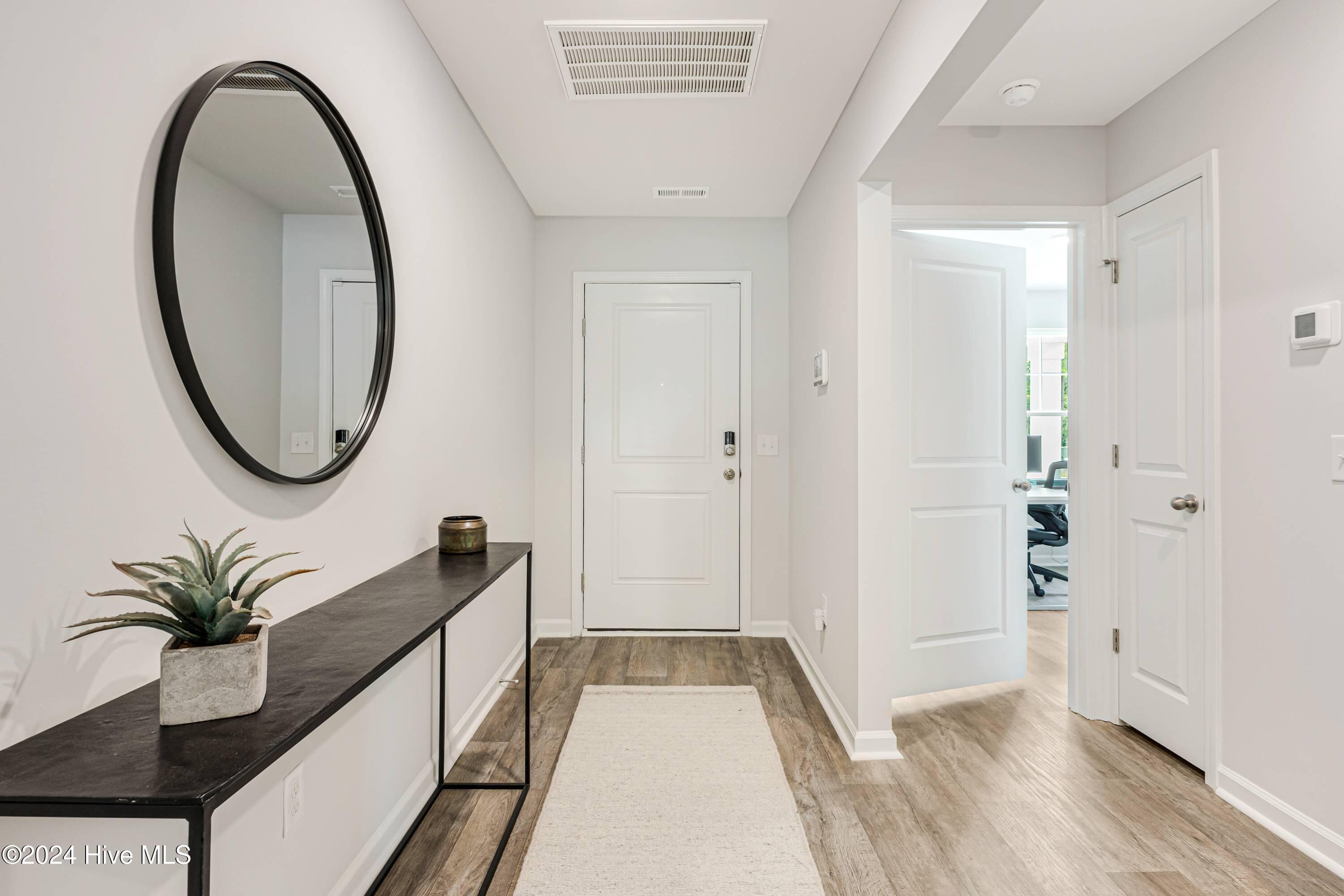 107 Little Doe Place Southwest, Unit CALI Supply, NC 28462 - Photo 2 of 15 666755ad160b947b13743931_107 Little Doe-