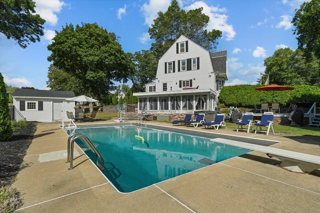 a view of a house with a swimming pool