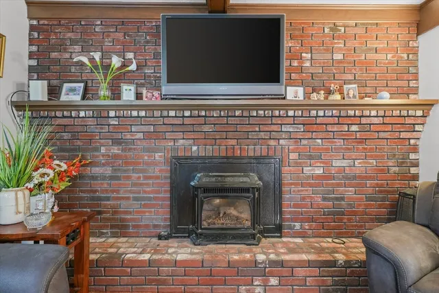 a living room with fireplace