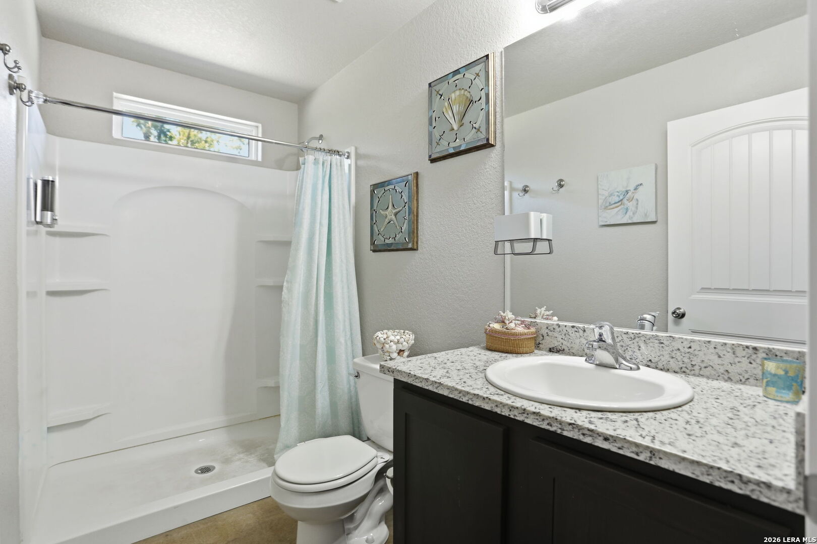 341 Ridge Road Spring Branch, TX 78070 - Photo 13 of 23 a bathroom with a granite countertop sink toilet and shower