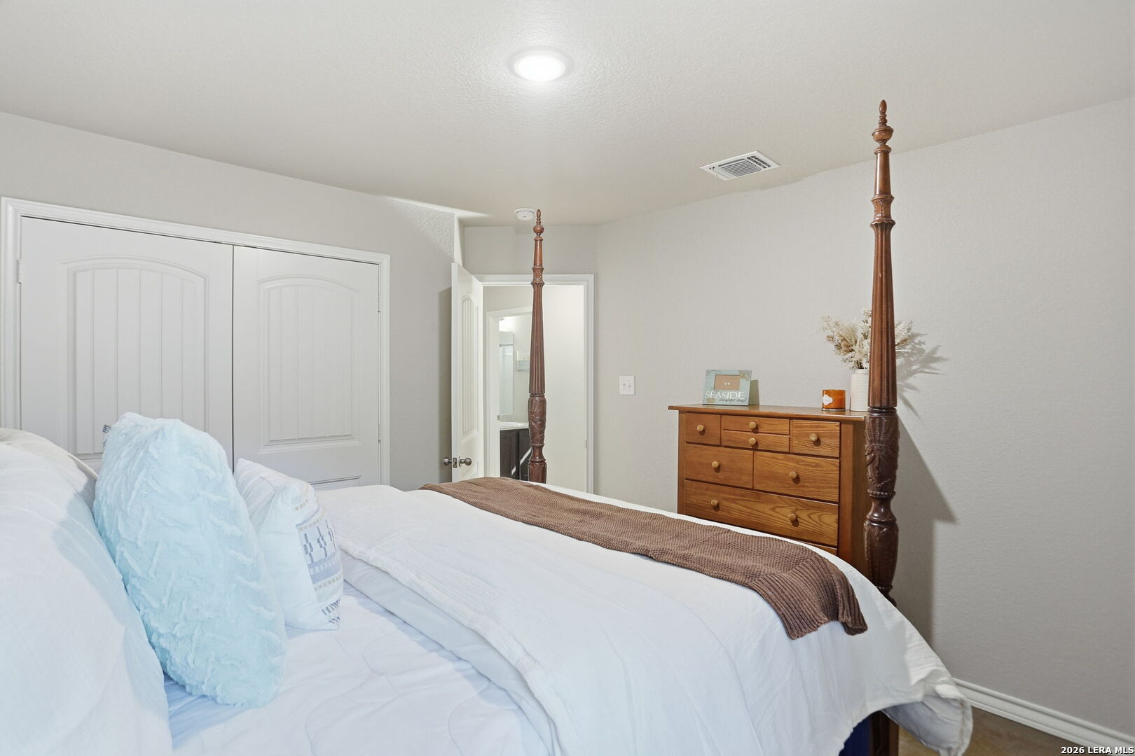 341 Ridge Road Spring Branch, TX 78070 - Photo 15 of 23 a bedroom with a bed and a closet
