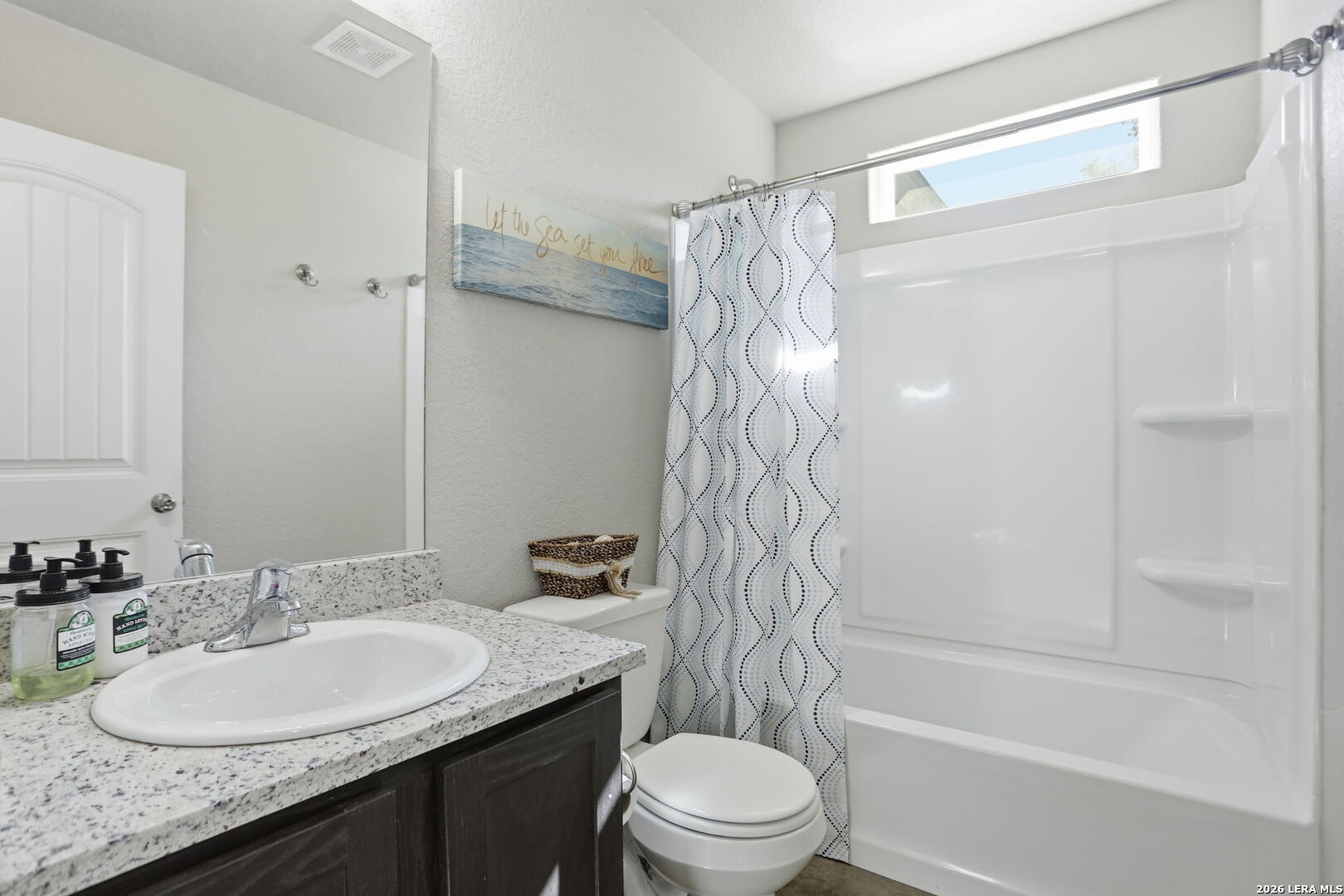 341 Ridge Road Spring Branch, TX 78070 - Photo 17 of 23 a bathroom with a granite countertop sink toilet and shower