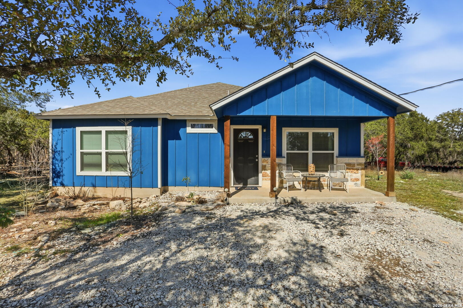 341 Ridge Road Spring Branch, TX 78070 - Photo 2 of 23 a front view of a house with garden