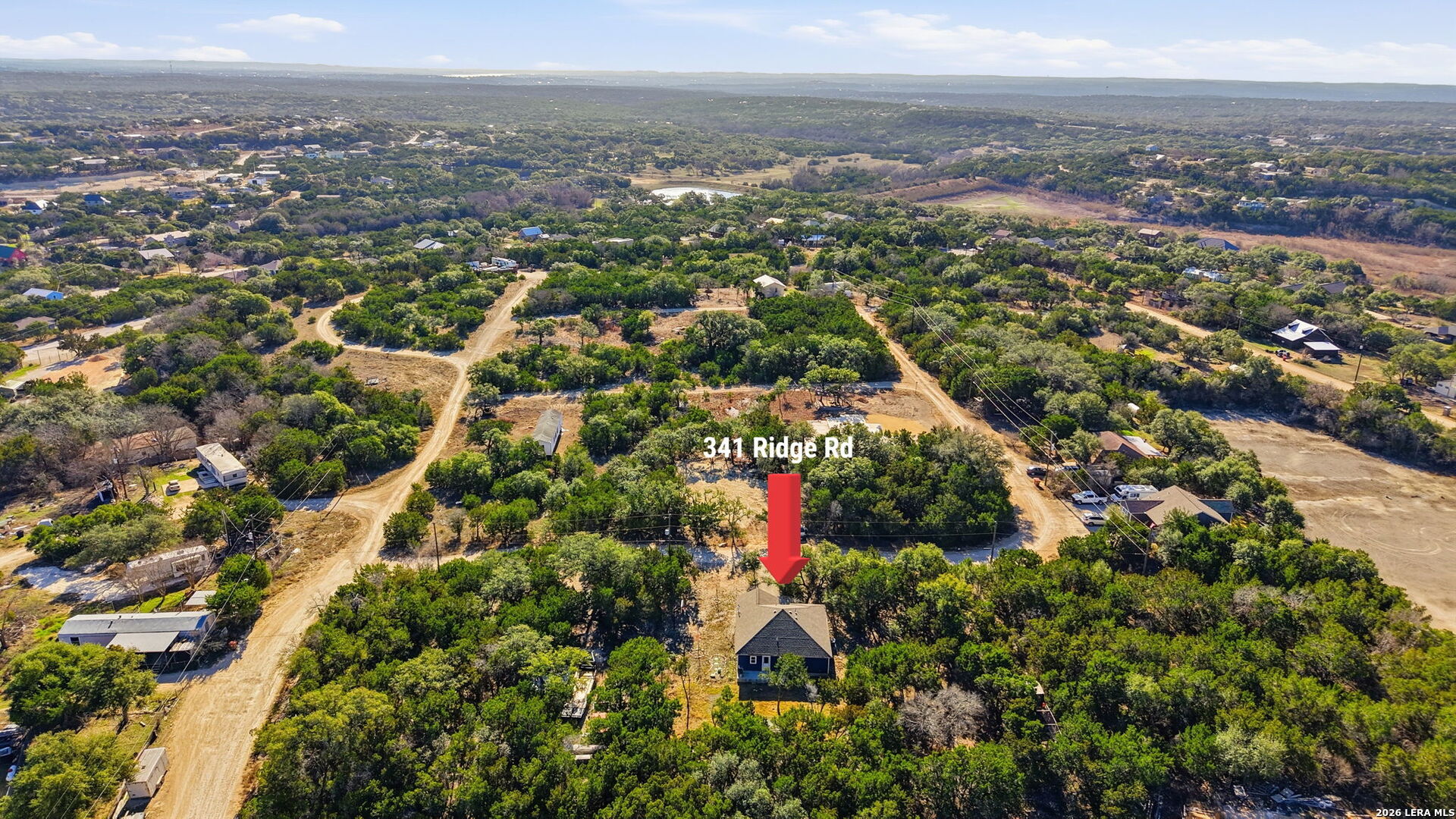 341 Ridge Road Spring Branch, TX 78070 - Photo 21 of 23 an aerial view of multiple house