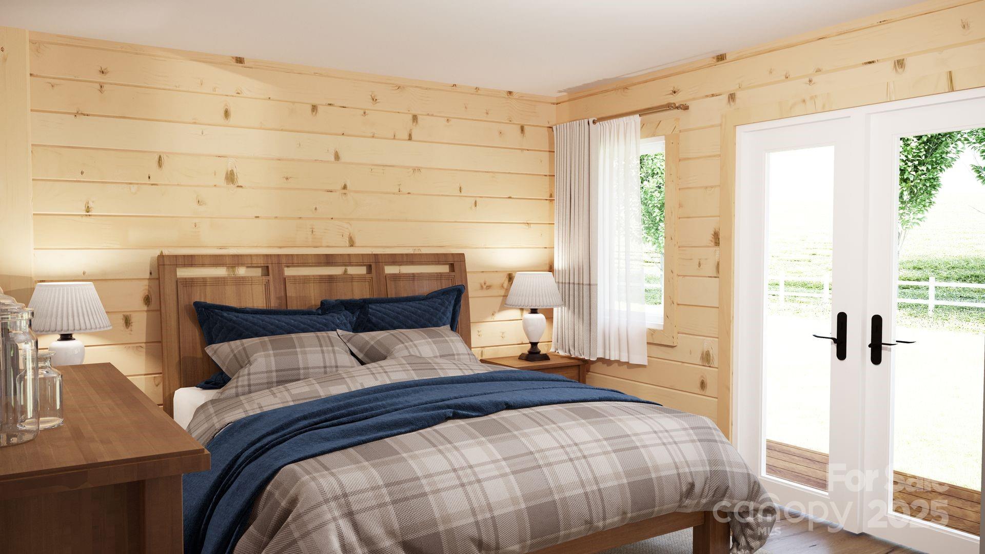 2576 Jumping Run Connelly Springs, NC 28612 - Photo 11 of 29 a bedroom with a bed and wooden floor