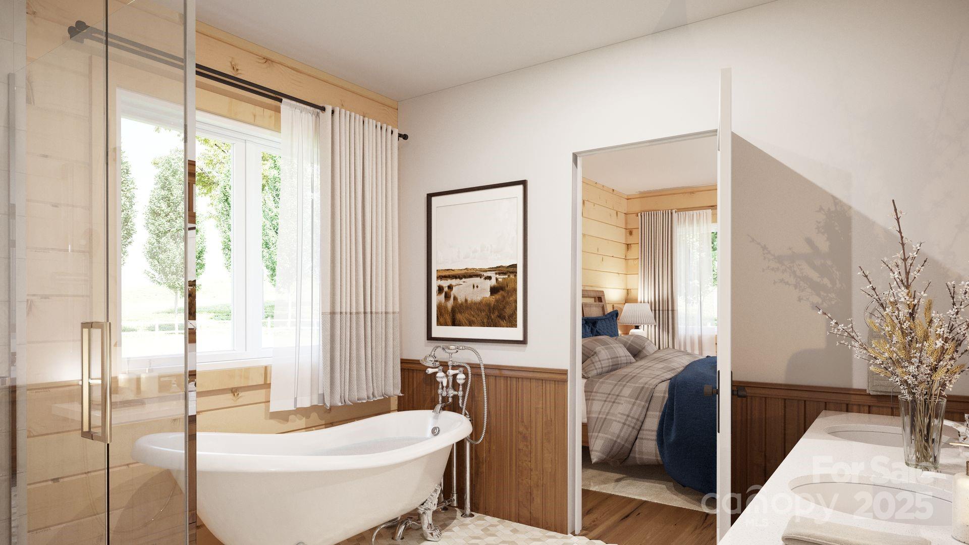 2576 Jumping Run Connelly Springs, NC 28612 - Photo 12 of 29 a bathroom with a tub toilet and sink