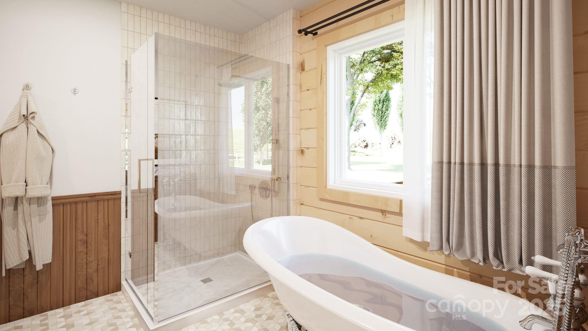 2576 Jumping Run Connelly Springs, NC 28612 - Photo 13 of 29 a spacious bathroom with a bathtub and shower