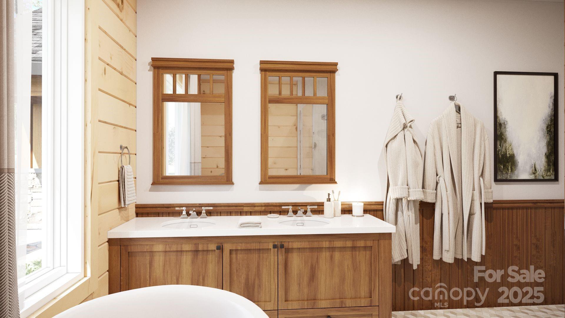 2576 Jumping Run Connelly Springs, NC 28612 - Photo 14 of 29 a bathroom with a sink and a mirror