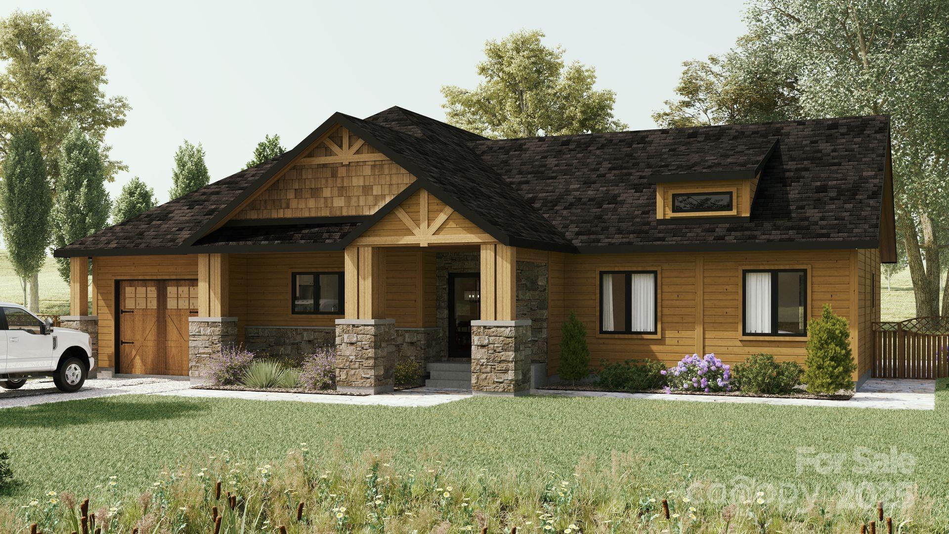 2576 Jumping Run Connelly Springs, NC 28612 - Photo 2 of 29 a front view of a house with a yard