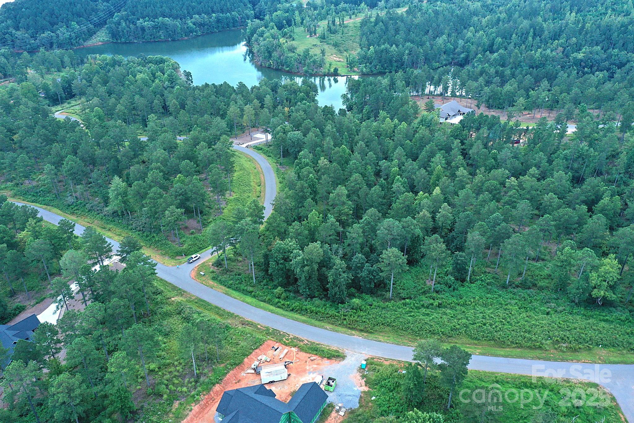 2576 Jumping Run Connelly Springs, NC 28612 - Photo 21 of 29 a view of a yard with a tree