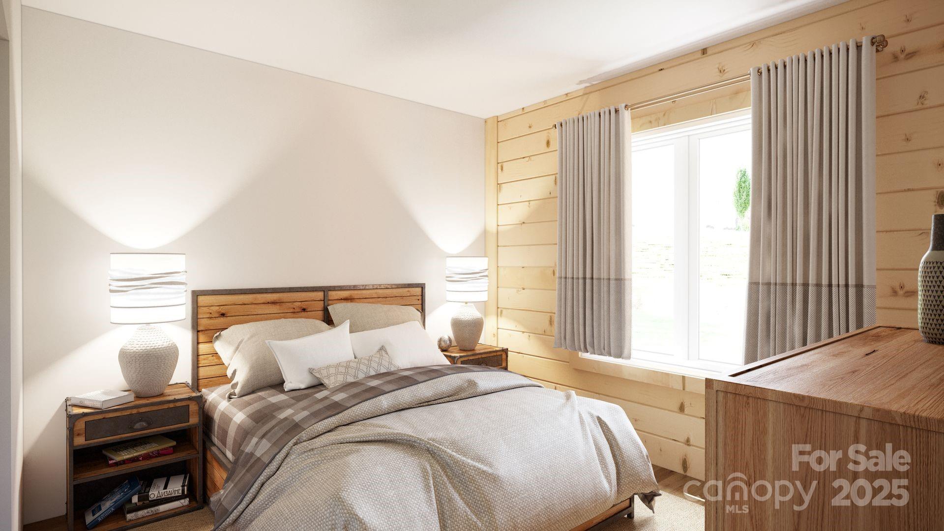 2576 Jumping Run Connelly Springs, NC 28612 - Photo 9 of 29 a bedroom with a bed and a window