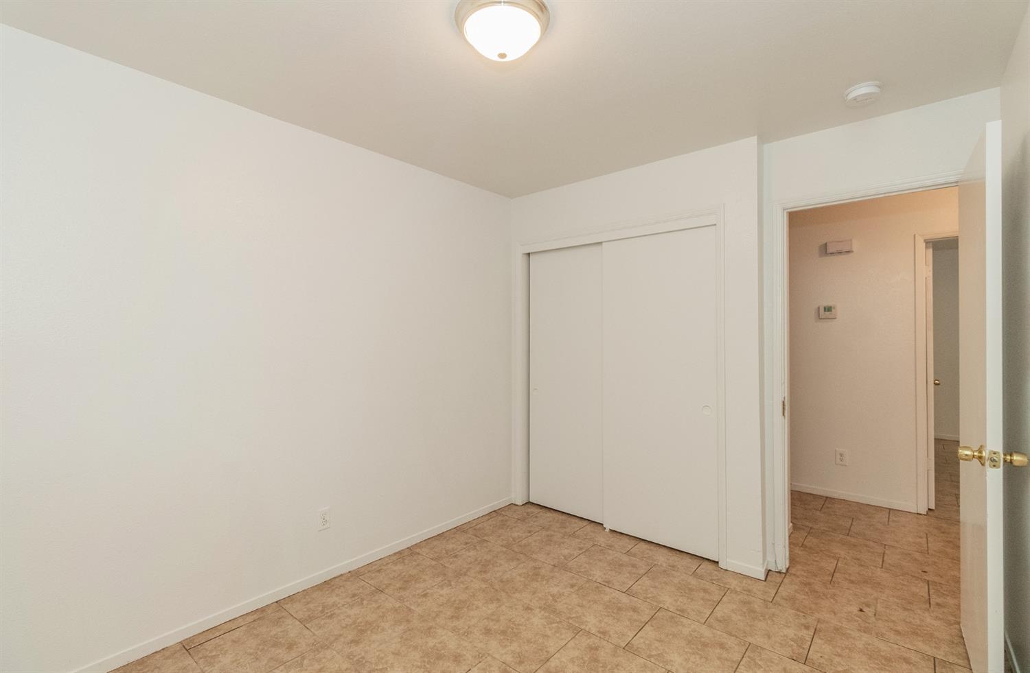 13551 7th Street Parlier, CA 93648 - Photo 13 of 17 a view of an empty room