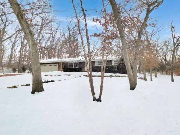 a view of snow on the road