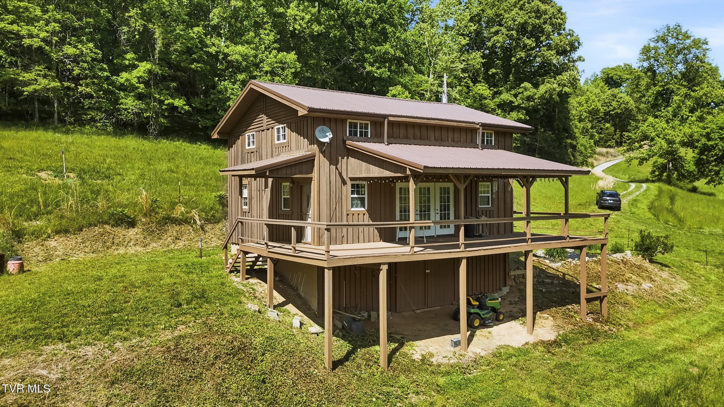 3609 Cave Springs Road Tazewell, TN 37879 - Photo 4 of 33 dji_20260511161144_0380_d