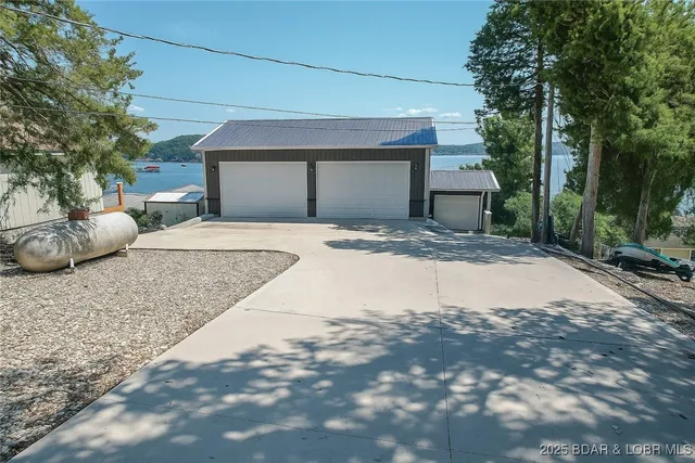 $599,900 | 29419 Towering Oaks Lane, Gravois Mills, MO 65037