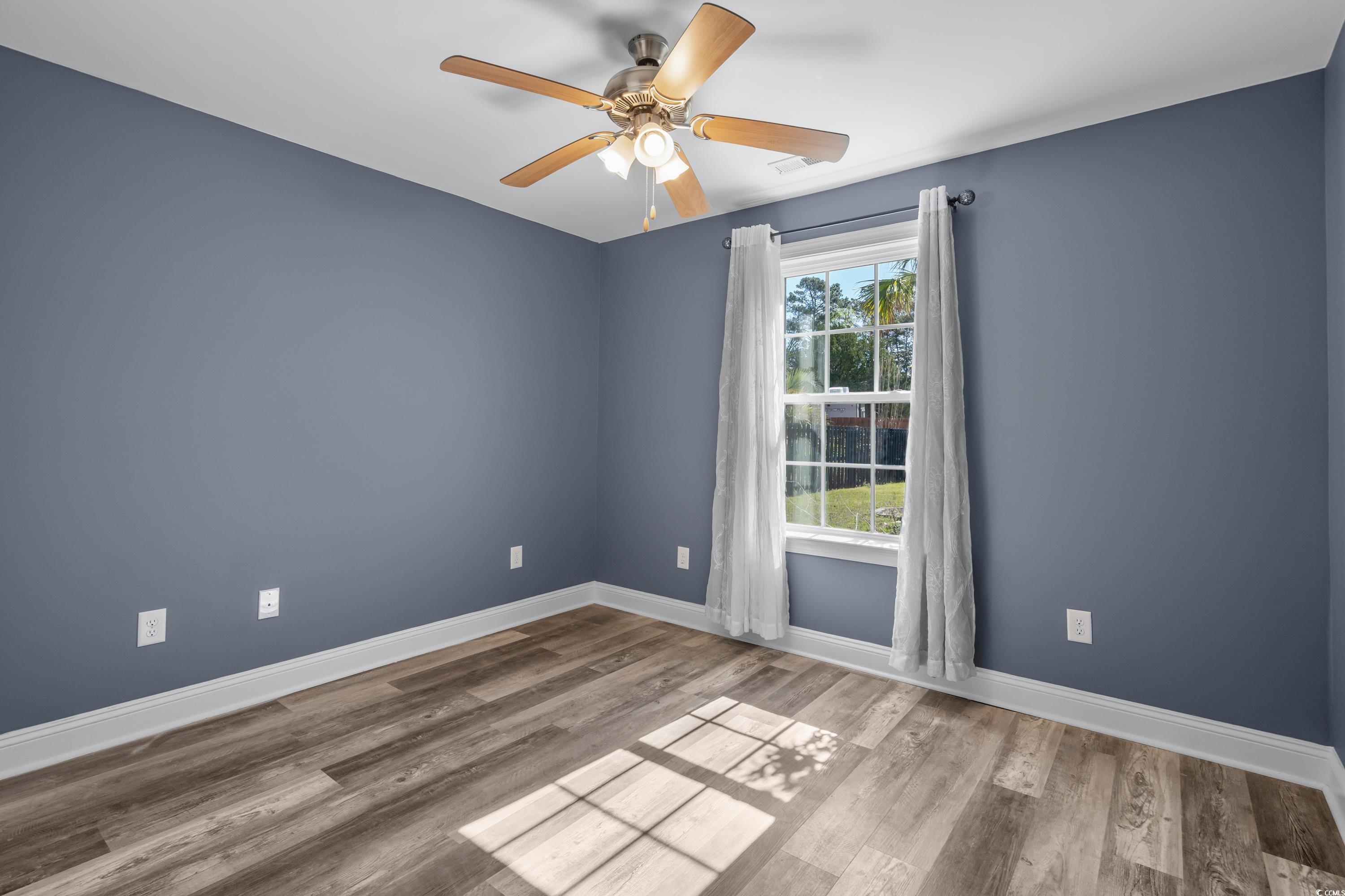 3836 Journeys End Road Murrells Inlet, SC 29576 - Photo 21 of 40 Unfurnished room with baseboards, ceiling fan, and