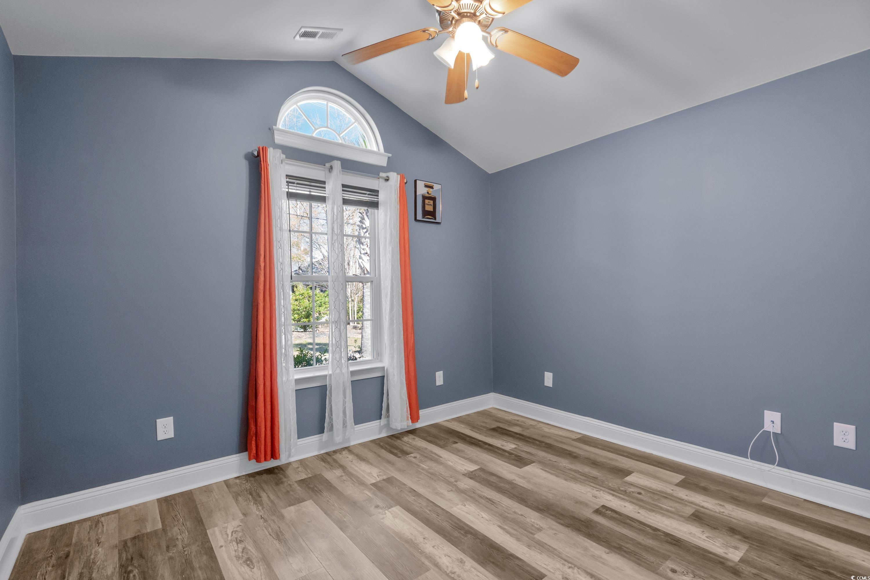 3836 Journeys End Road Murrells Inlet, SC 29576 - Photo 24 of 40 Empty room with wood finished floors, baseboards,