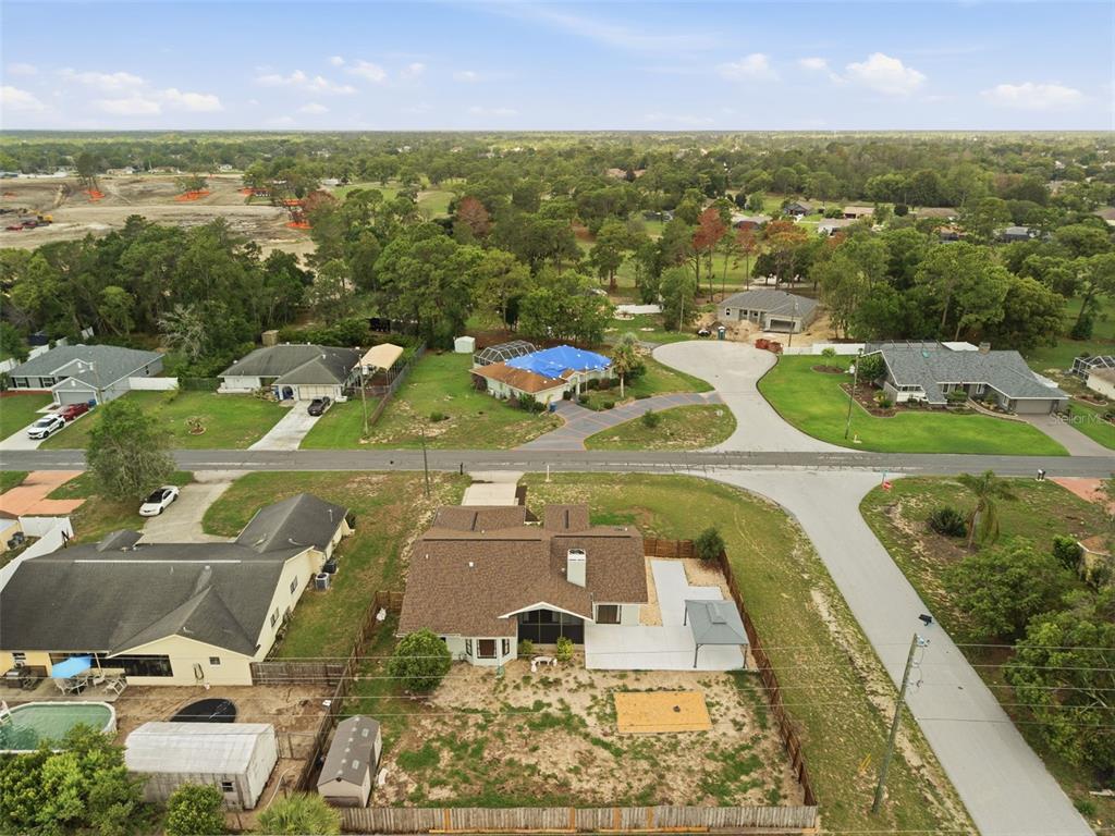 4966 Keysville Avenue Spring Hill, FL 34608 - Photo 46 of 48 an aerial view of residential houses with outdoor space