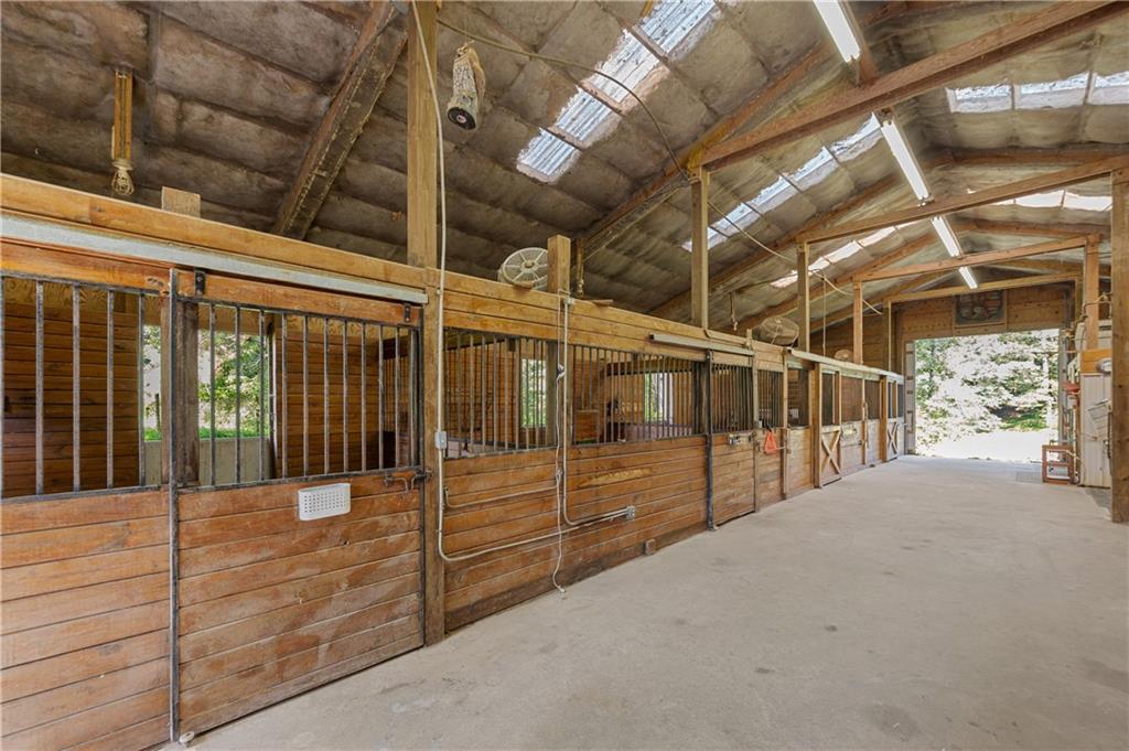 6410 Concord Road Cumming, GA 30028 - Photo 1 of 1 4 extra large 12x16 ft stalls w/heavy stall mats