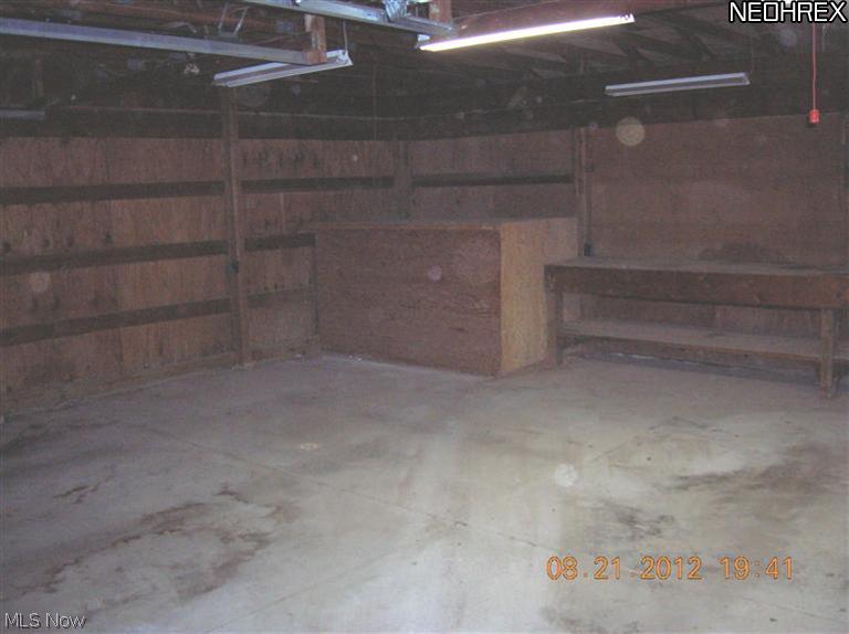 995 Doyle Road Jefferson, OH 44047 - Photo 12 of 13 The box in the corner is the dog pen inside the garage.
