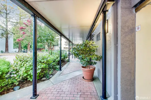 a view of a hallway with windows