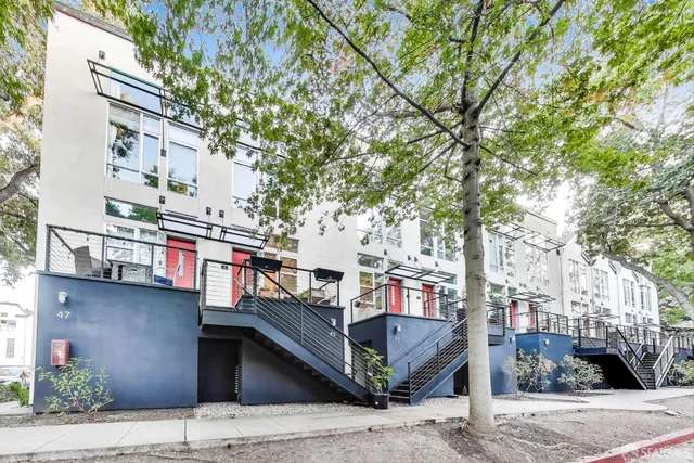 a view of parking garage with cars
