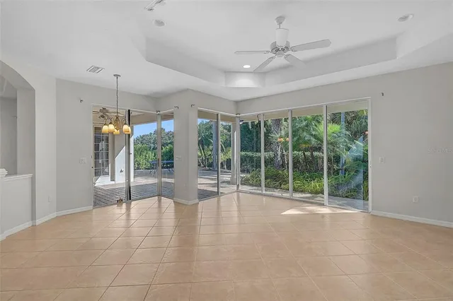 a view of an empty room with windows