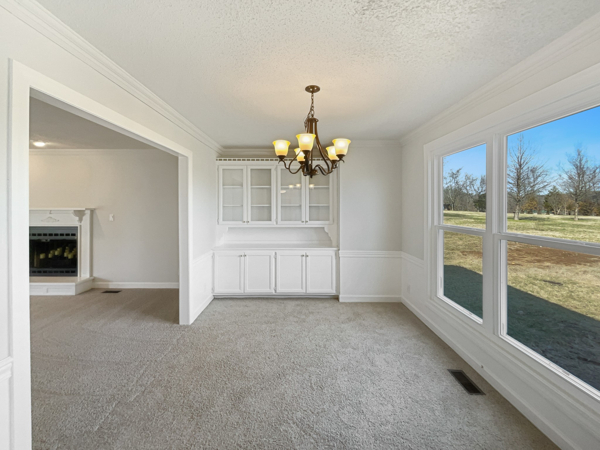 1683 South Walker Road Pleasant View, TN 37146 - Photo 12 of 26 wooden floor in an empty room with a window