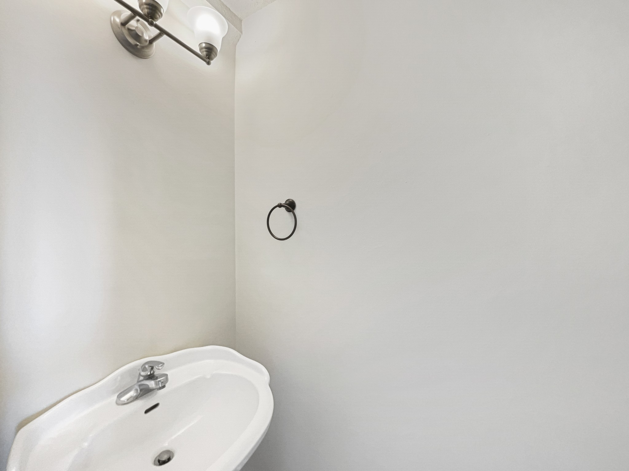 1683 South Walker Road Pleasant View, TN 37146 - Photo 14 of 26 a bathroom with a sink and mirror