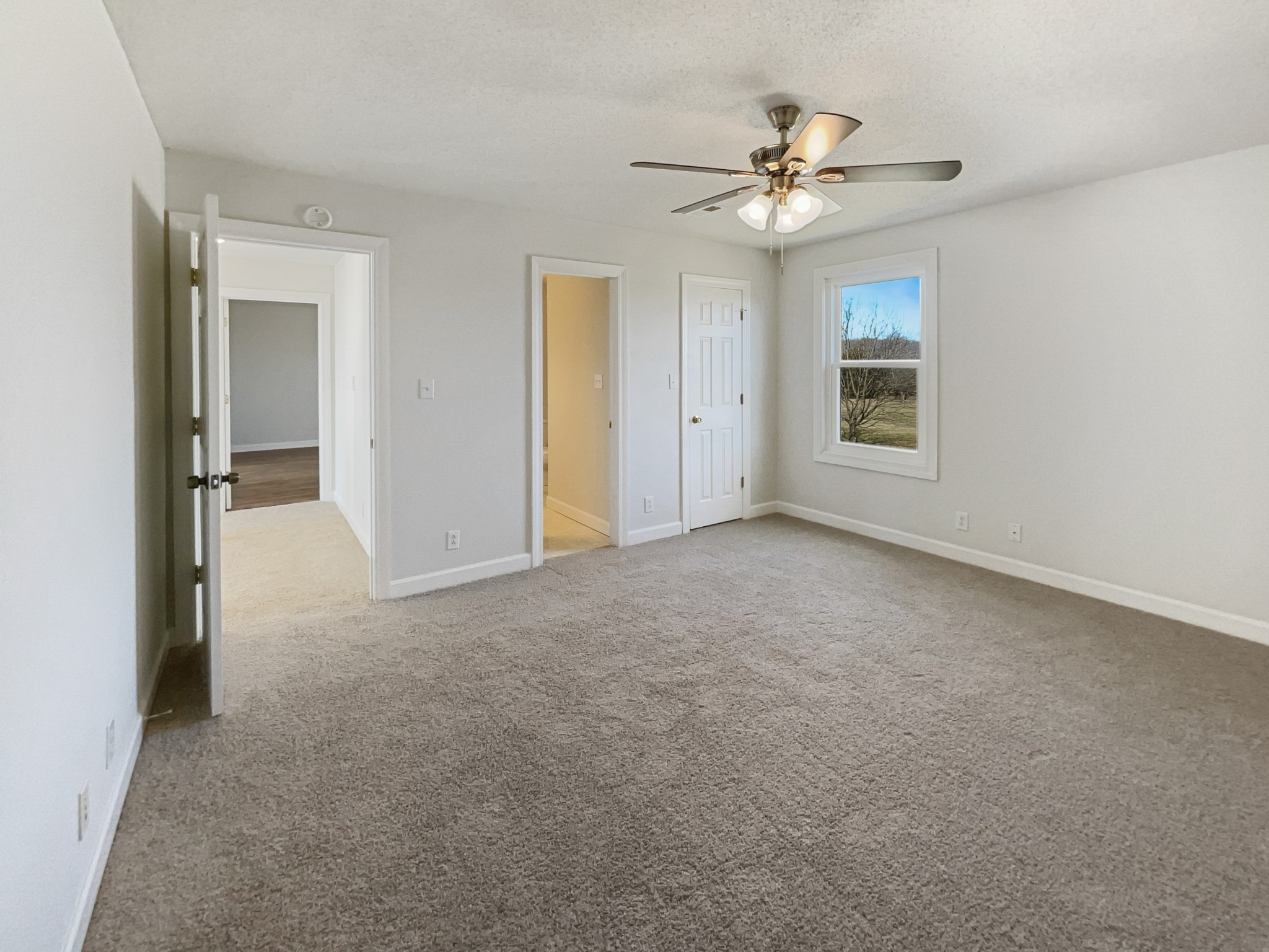 1683 South Walker Road Pleasant View, TN 37146 - Photo 20 of 26 a view of a livingroom with a ceiling fan and window