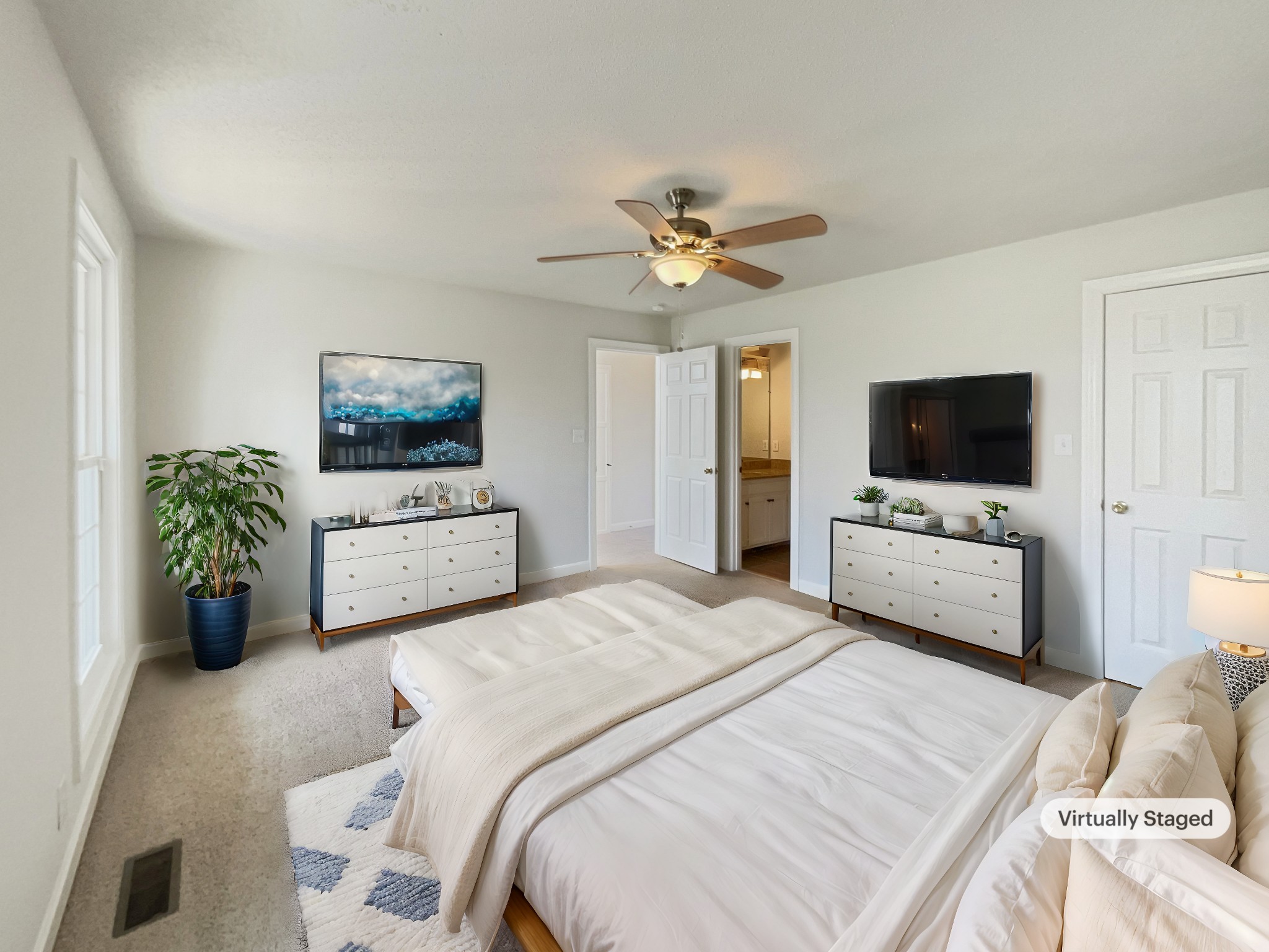 1683 South Walker Road Pleasant View, TN 37146 - Photo 4 of 26 a bedroom with a bed flat screen tv and a couch